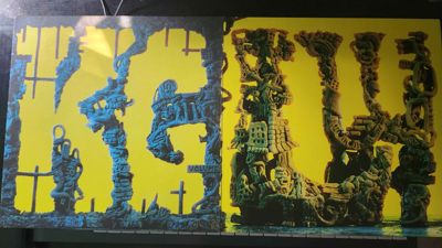 Photo of the covers for the vinyls of K.G. and L.W. by King Gizzard & The Lizard Wizard,
lined up next to one another to show that the cover art pieces are meant to comprise a
larger piece